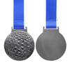 Customizable Low Cost Silver Toned Circular Ryder Cup Golf Medal with Textured Patterns and Blue White Ribbon