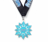 Snowflake - shaped medal for “ICE Elite All Stars”. Blue glitter design, black ribbon.