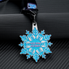 Snowflake - shaped medal for “ICE Elite All Stars”. Blue glitter design, black ribbon.