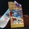 Unique medal shaped like a chocolate bar, with colorful enamel design showing San Diego - themed elements (bridge, waves). Inscribed “San Diego 2017” and paired with a “REAT C” ribbon. Ideal for comme