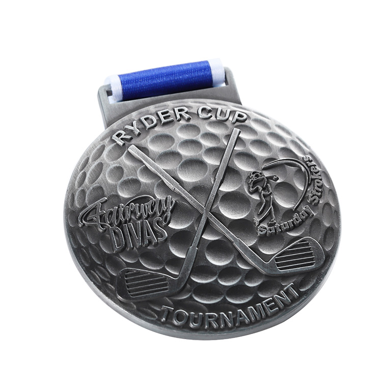 Customizable Low Cost Silver Toned Circular Ryder Cup Golf Medal with Textured Patterns and Blue White Ribbon